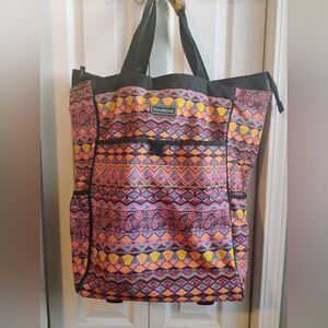 Pink and Yellow Travel Bag with Vibrant Pattern